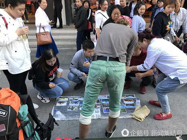 外国驴友在中国摆摊卖旅行照：一张照片有人给100元，小哥1小时赚千元（组图） - 3