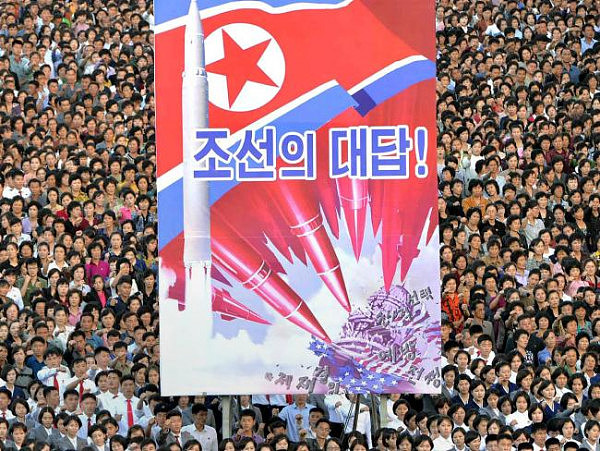 Thousands of North Koreans take part in an anti-US rally in Kim Il-Sung Square in earlier this week. Picture: KNCA/AP