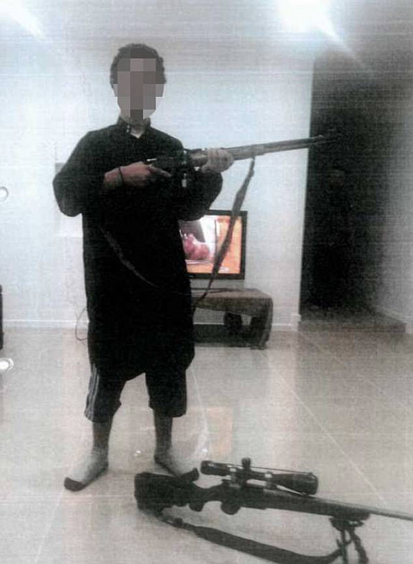 Chilling pictures reveal a 14-year-old wannabe Jihadi posing with weapons and doing the ISIS salute