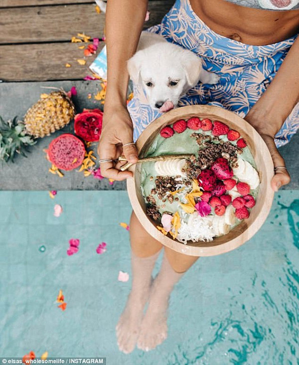 From fresh young coconuts to smoothies filled with exotic fruits, here FEMAIL takes a look at just what she eats on a daily basis (pictured: her smoothie bowl)