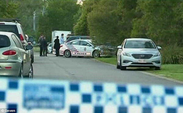 Saint George Street in Kuraby remains closed as police officers investigate the murder
