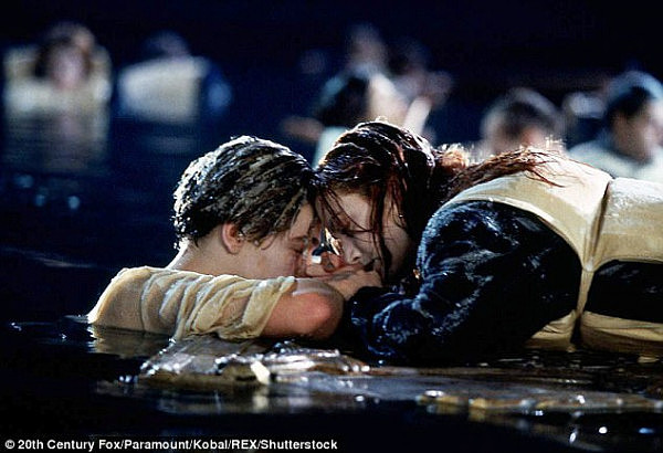 After the ship goes down Jack and Rose attempt to clamber onto a piece of debris in the freezing cold North Atlantic Sea 