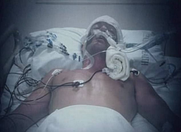 He was left fighting for his life in hospital (pictured) after a shark attack in February this year