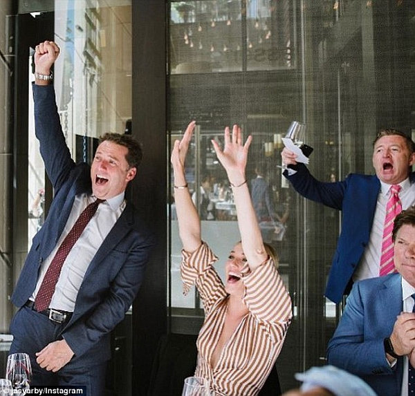 'We said yes': Former colleague Karl Stefanovic and his girlfriend Jasmine Yarbrough's faces said it all in an Instagram post that showed them celebrating on a balcony