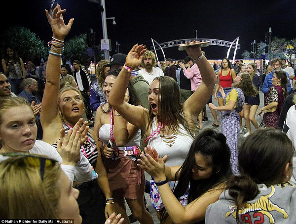 Bust a move! Many were seen dancing in the streets as the week-long party raged on towards day three