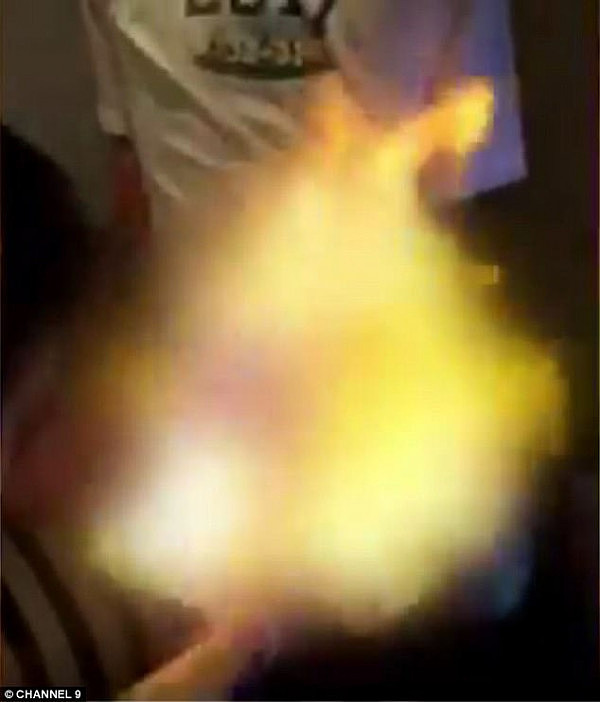 Schoolies revellers have taken their raucous antics to the next level after video has emerged apparently showing youngsters setting themselves on fire