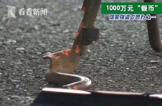 日本男子抢银行到手1000万 结果只有2万是真的