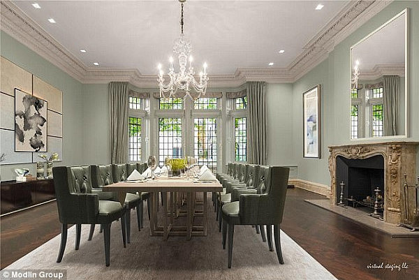 The high life: A spacious dining area features a statement chandelier and ornate fireplace 