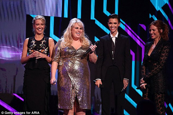 Shrinking frame: Taking the stage to present the award for Best International Artist, Ruby was seen wearing a slim-fitting pant-suit that swamped her frame (pictured L-R Anna Camp, Rebel Wilson, Ruby Rose, Brittany Snow)