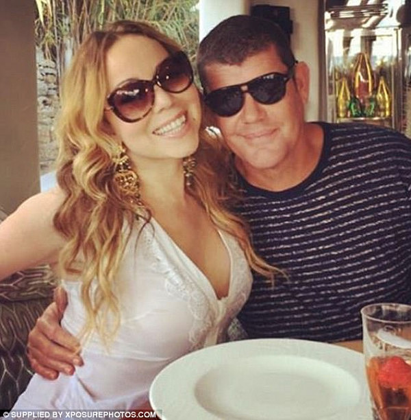 He paid out: Mariah Carey has reportedly reached a financial settlement worth millions with her former fiancé James Packer; here they are seen in September 2016