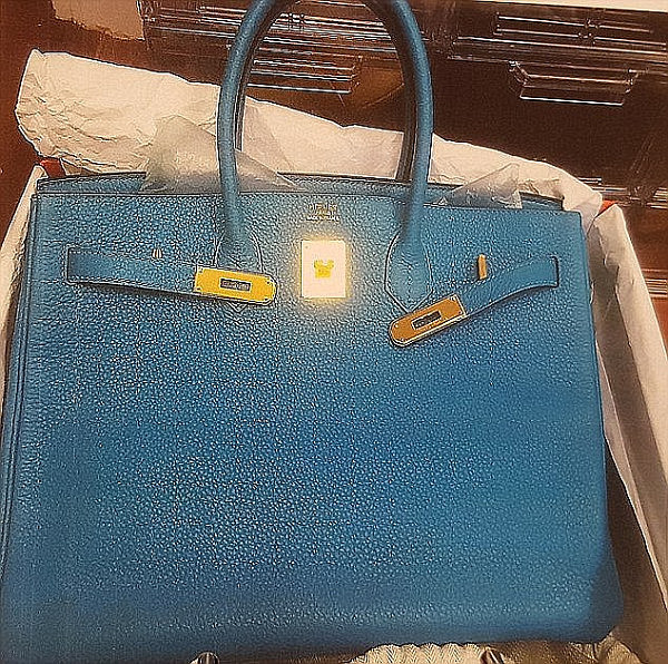 46D59C0800000578-5131609-Ms_Lee_has_a_large_number_of_Hermes_bags_seized_allegedly_bought-a-6_1512052217973.jpg,0