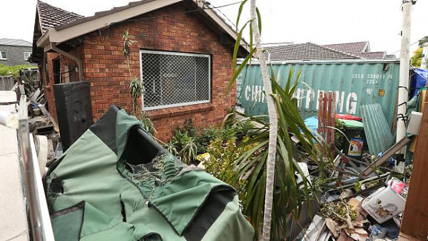 Buyers have been turning away from the detached house market because of the high prices. This burnt down house in Rosebery is listed at $1.3 million. Picture: Richard Dobson