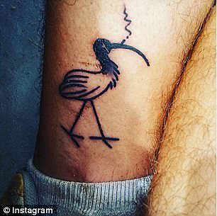 Jarod Woldhnis, 18, had two variations of the bird tattooed on him - one smoking and another drinking