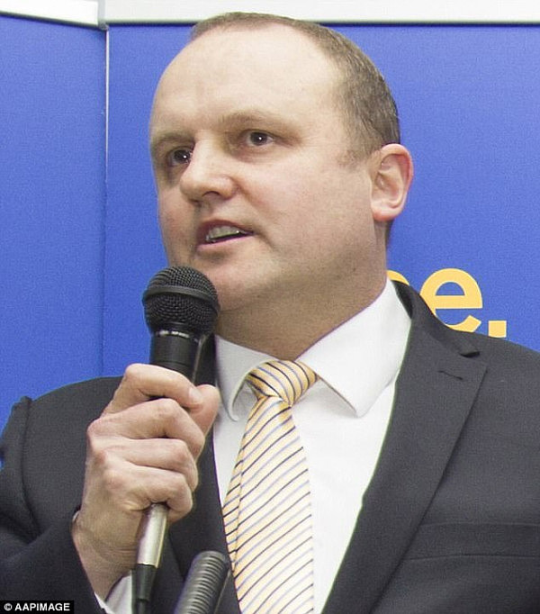 Federal MP Jason Wood (pictured) has claimed immigrants should have lessons on Australian law to stop them from turning to crime