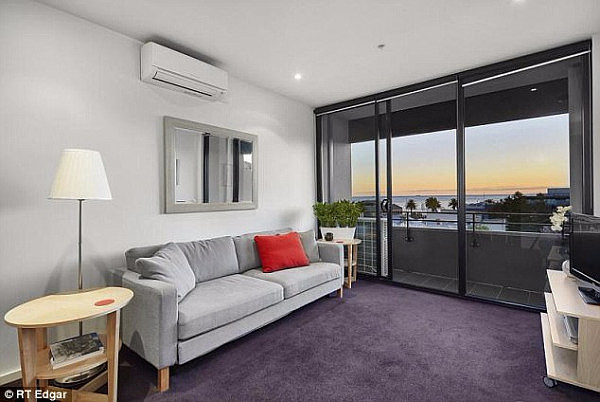 The one-bedroom apartment in Port Melbourne is valued at $530,000 and boasts a balcony with bay views