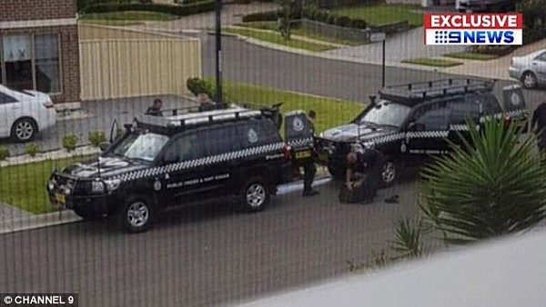 The 23-year-old man was arrested at a McDonald's in Rosehill, western Sydney, on Saturday afternoon before police searched a home in Glenwood (pictured) 