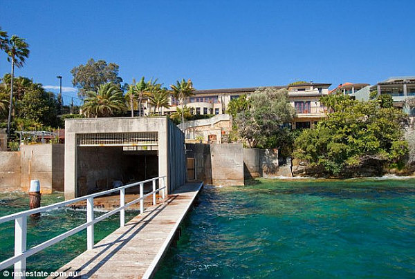 The sweeping backyard includes  81 metres of water frontage including its own jetty and boathouse