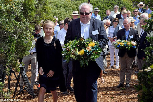 Harold Holt's biological son Sam Holt lays a wreath on the 50th anniversary of his father's disappearance 