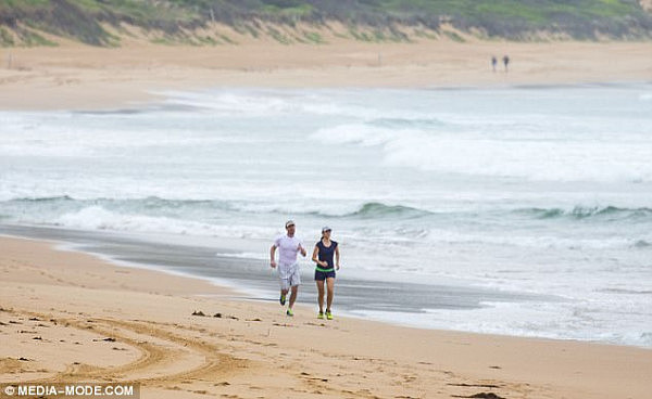 The beach itself lies at the end of a long peninsula, fringed by surf on one side and the tranquil area of Pittwater on the other (pictured)