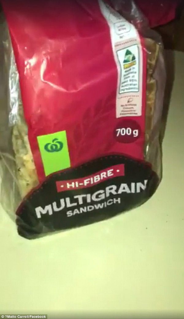 Matto Carrol is furious after allegedly finding maggots crawling through a loaf of Woolworths brand multigrain bread (pictured)