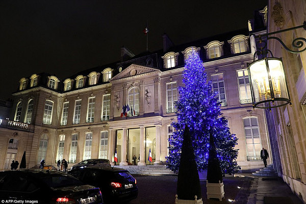 Sydney City Council was able to find the funds to cover the city in rainbow bunting and Yes flags for the same-sex marriage plebiscite, but not for Christmas lights (pictured is the Elysee Palace in Paris)