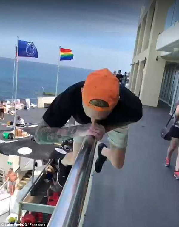 Prankster Luke Erwin jumped off the Sydney's Bondi Icebergs balcony into the pool metres from other swimmers