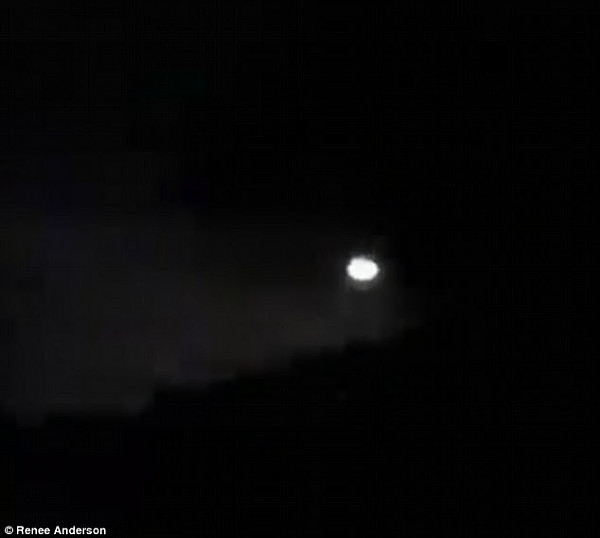 A mysterious light flashing across the night sky has been captured on camera (pictured)
