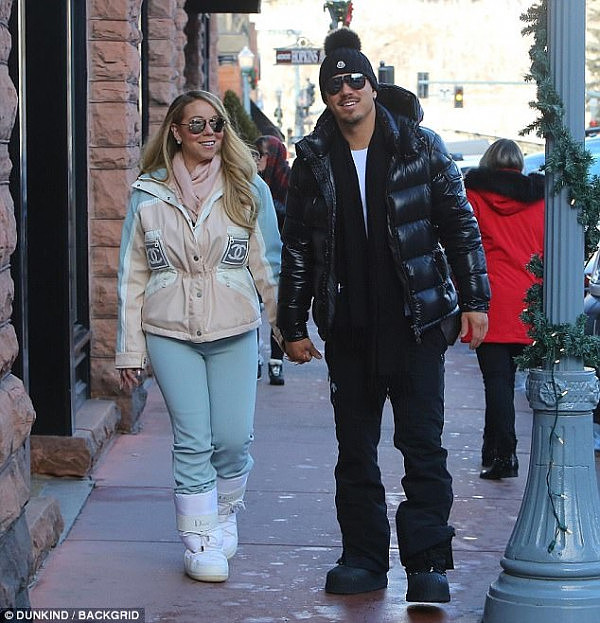 New flames: In a strange turn of events, the We Belong Together songstress is also vacationing in Aspen with her 34-year-old boyfriend Bryan Tanaka