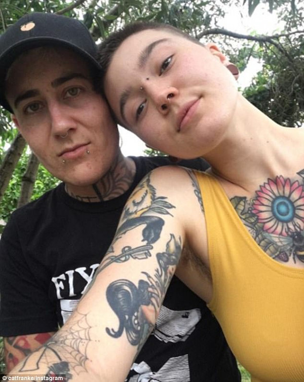 A lesbian couple (pictured) who claim they were repeatedly abused with homophobic slurs by a fellow Jetstar passenger claim flight crew did nothing but watch and 'giggle'