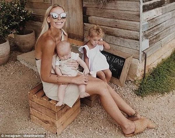 Jordan Lee, whose Instagram name appears as Jordyn Jones, sits with her baby and daughter Winter