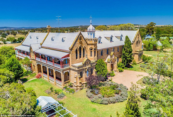 This breathtaking sandstone home appears to be straight out of 19th century Britain, but it's actually up for sale in country Queensland