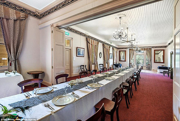 'The Abbey' boasts 50 rooms - including chapel, a grand dining area (pictured) as well as 14 bedrooms and 12 bathrooms