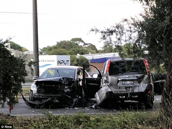 Ms Hall, 18, was dragged from her convertible by a group of three men in a stolen Nissan X-Trail who were being pursued by police in southeast Melbourne (pictured is the crash scene)