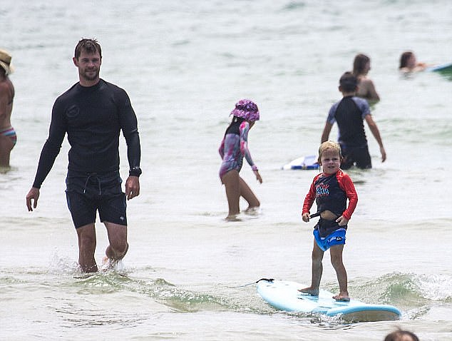 On a roll! While things started off a little bit shaky, Sasha began to get used to the ebb and flow of the waves and stand up straight - much to the excitement of his dad