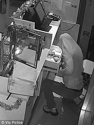 49ADA80B00000578-5447443-The_bungling_burglar_was_caught_on_CCTV_robbing_a_restaurant_in_-a-6_1519861136872.jpg,0