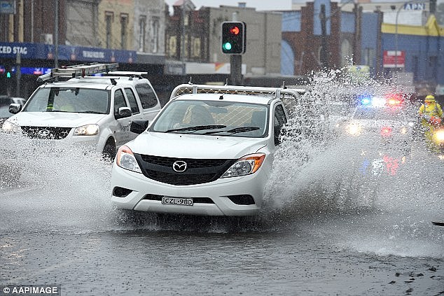 A severe weather warning has been issued for Newcastle, the Central Coast and Port Stephens areas with heavy bursts of rain forecast (pictured is 2016 flooding)
