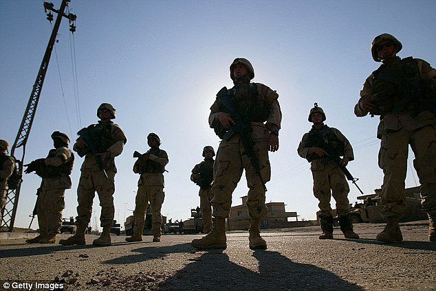 Australian Federal Police officers will undergo three-day 'Muslim sensitivity training' to better understand the culture of Islam (Soldiers march in Iraq) 