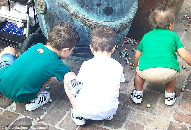 Excited children who waited more than 40 minutes beside a high-way found all the chocolates had gone 15 minutes after the event began in Sydney