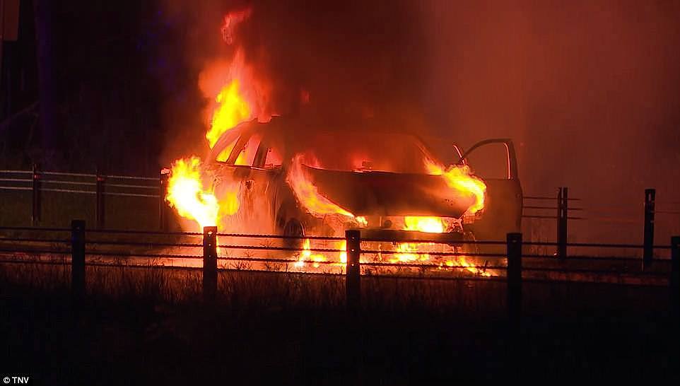 Ablaze: The car suffered engine trouble before the officers pulled over and it burst into flames on the side of the motorway