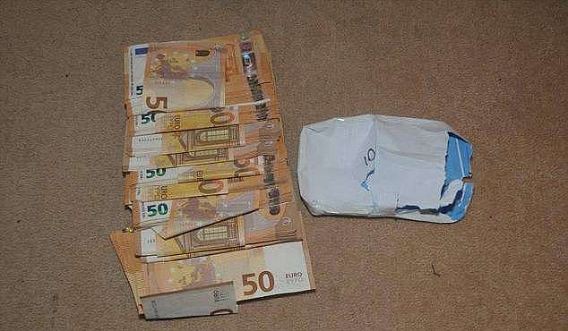 Seizure: Police believe that the cash (pictured) which was seized on Tuesday is the proceeds of drugs trafficking in Australia