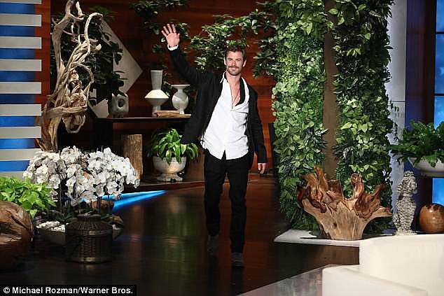 Hunky: The Thor star looked hunky in a white shirt and a black suit during his appearance on the talk show 