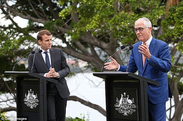 Emmanuel Macron described Malcolm Turnbull's 60-year-old wife Lucy as 'delicious' in an amusing gaffe today