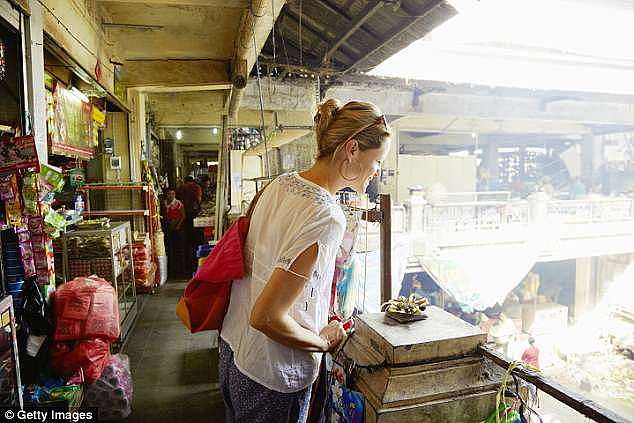 Mr Troy said shoppers who are considered easy targets have their items placed in red plastic bags (stock image)