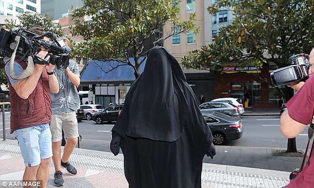 Ms Elzahad (pictured), who arrived in court dressed in a full black veil and surrounded by supporters, is the first person to be convicted of contempt of court in NSW on religious grounds 
