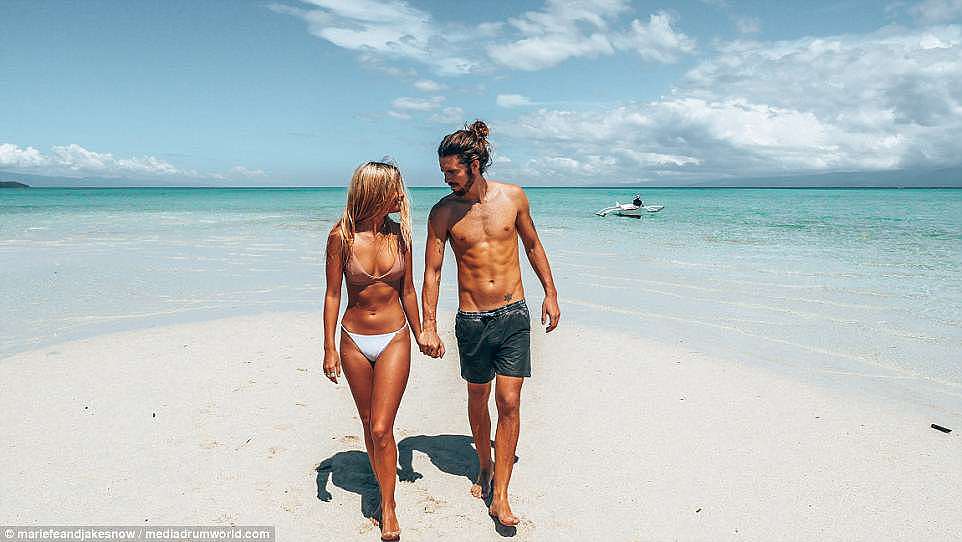 Jake Snowden, 26, (right) from Adelaide in South Australia met Marie Ferling, (left) from Dusseldorf Germany by chance on a beach in Thailand. Now the couple have travelled to 22 countries in the same amount of months