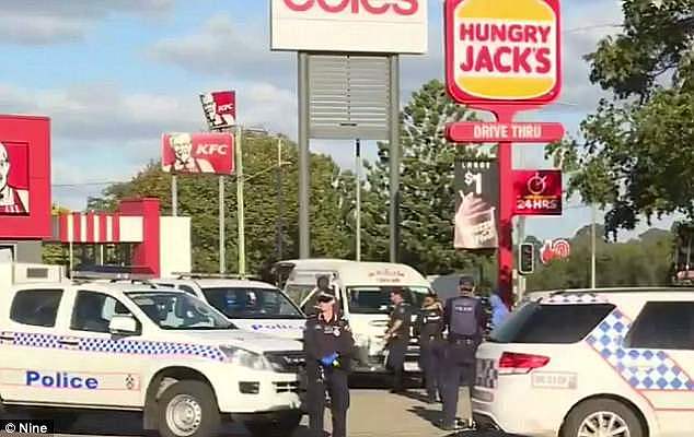 Police officers also searched a car parked at a nearby Hungry Jack's on Sunday evening
