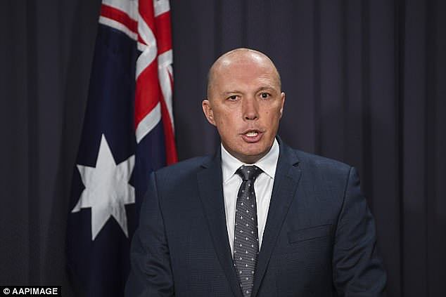 Minister Dutton (pictured) said at least 14,000 people in Indonesia ready to get on boats 'tomorrow'
