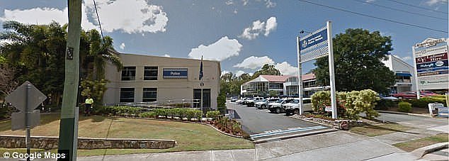 A Queensland police officer is recovering in hospital and an investigation is underway after he accidentally shot himself while on duty at the Springwood Police station (pictured)
