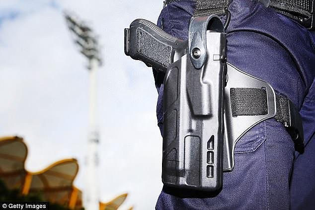 The officer reportedly shot himself in the leg while trying to put a handgun in to his holster (stock image)