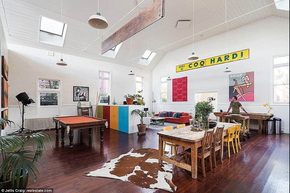 Bright coloured furniture stand out against the bright white walls (pictured above) have attracted well known Melbournian's to the Northcote property.
